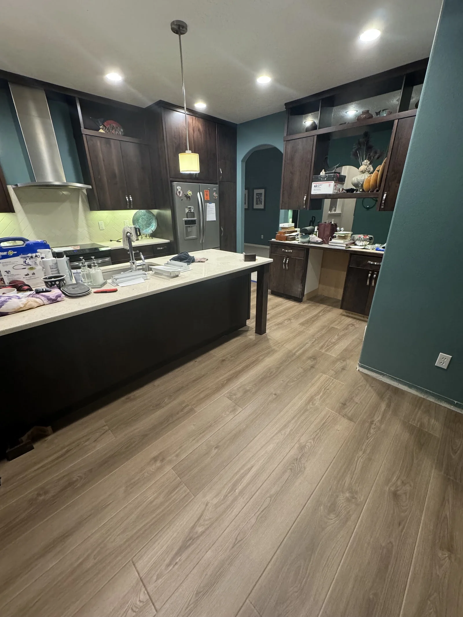 Wood-look luxury vinyl plank in a remodeled kitchen
