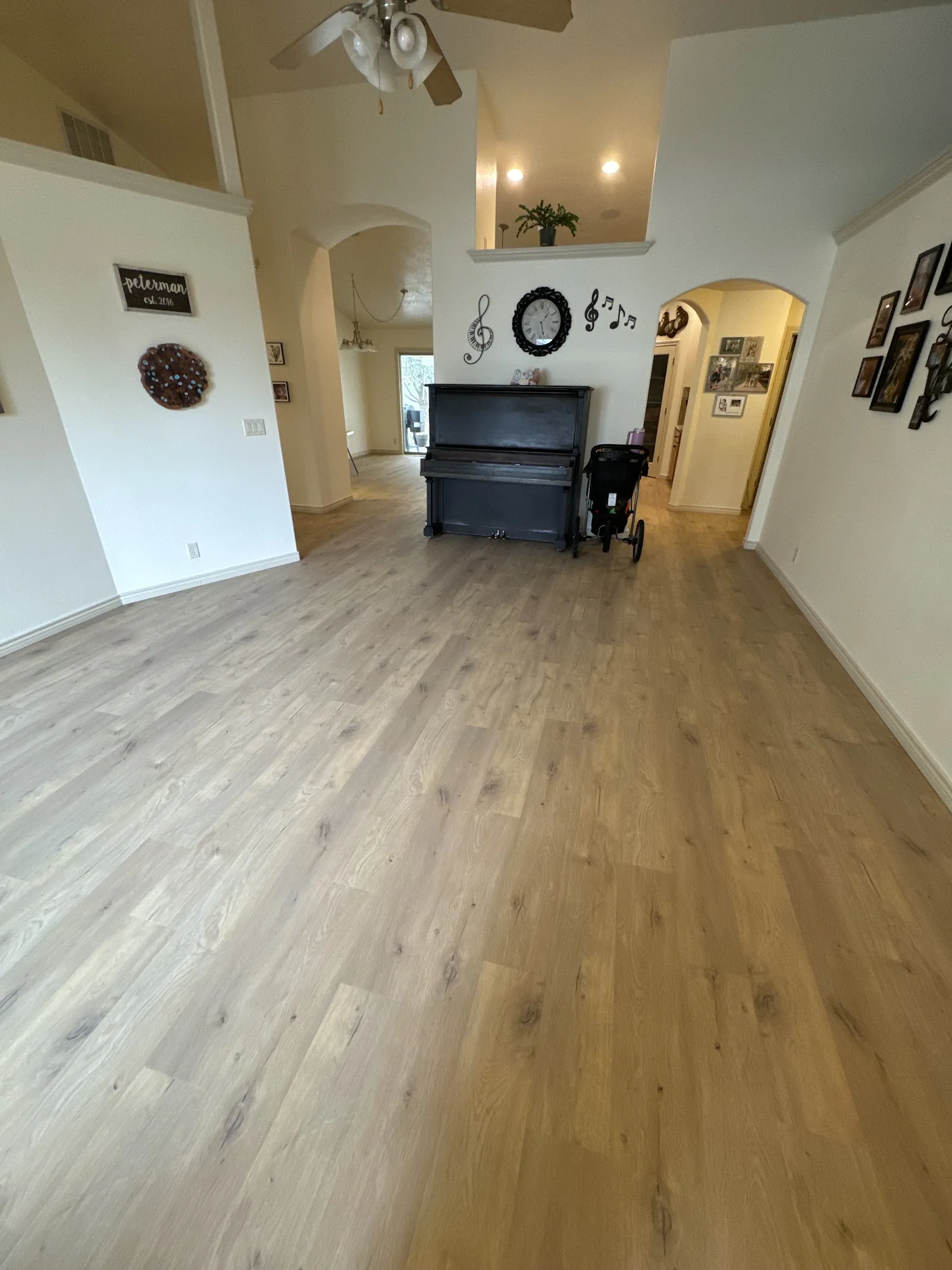 Light oak-look luxury vinyl plank throughout an open room