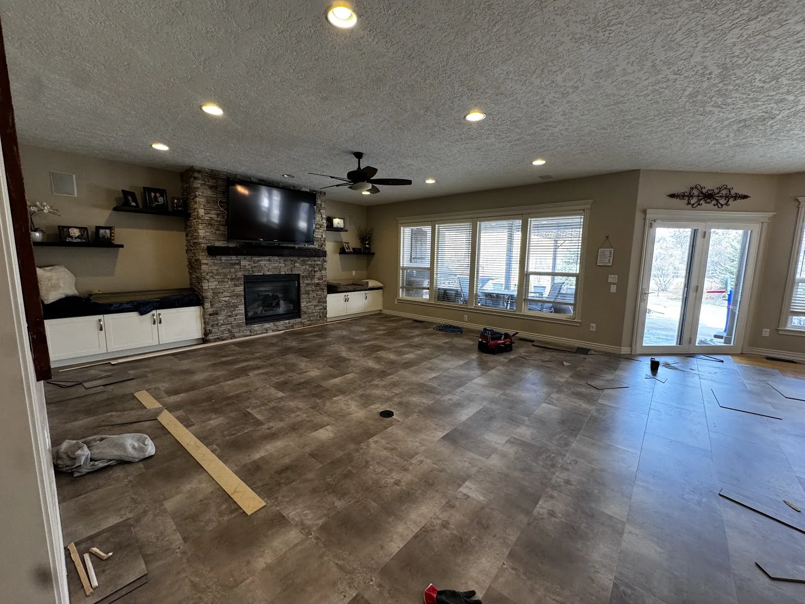Wide-plank luxury vinyl plank in an open-plan home